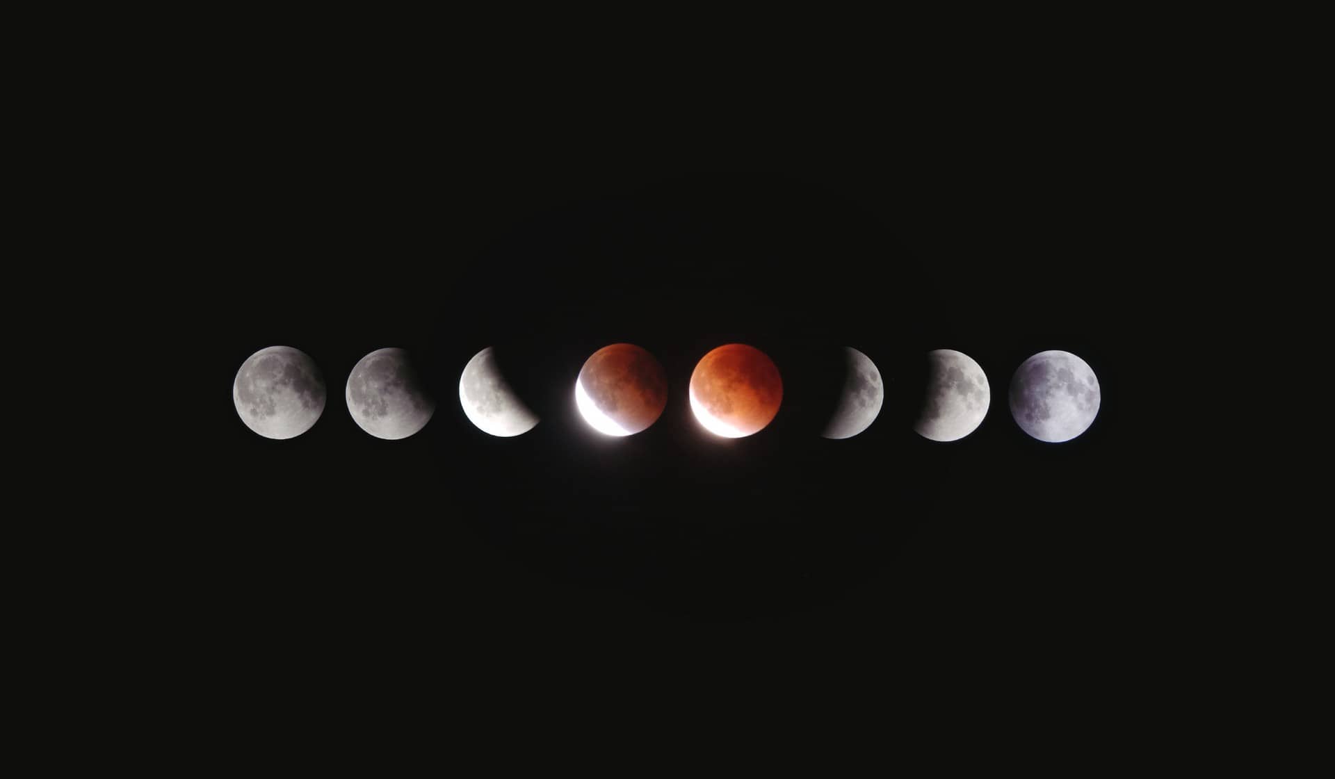 Planets on a horizontal line with black background