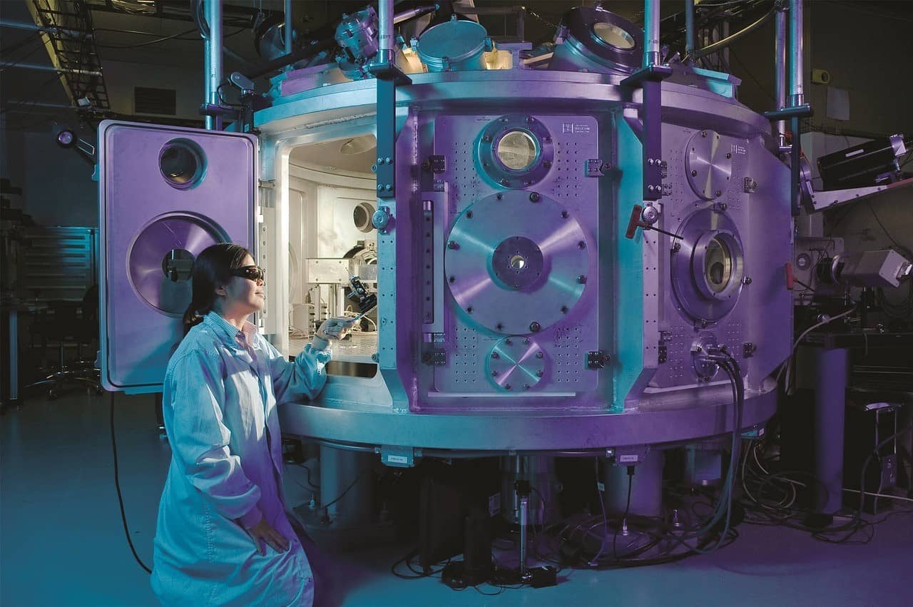 Scientist working on machine